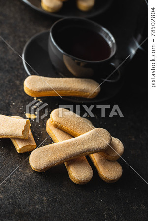 Italian cookie savoiardi. Sweet biscuits. Sponge cookies tiramisu. Italian cookie savoiardi. Sweet biscuits. Sponge cookies tiramisu. 78502804