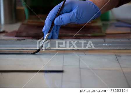 Background paint brush hand closeup Background paint brush hand closeup 78503134