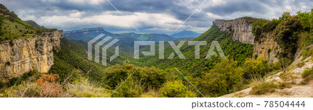 Nice valley from Spain, near village Rupit in a cloudy day Nice valley from Spain, near village Rupit in a cloudy day 78504444