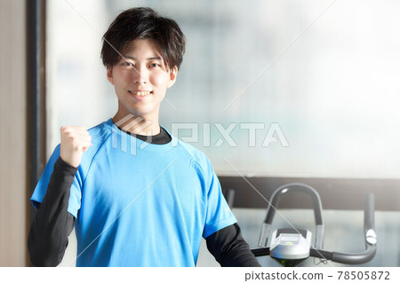 A young man in training wear posing 78505872