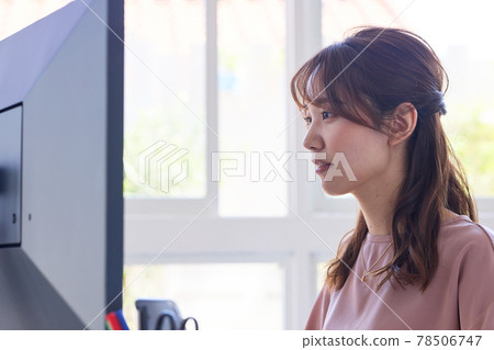 Woman doing remote work at home Woman doing remote work at home 78506747