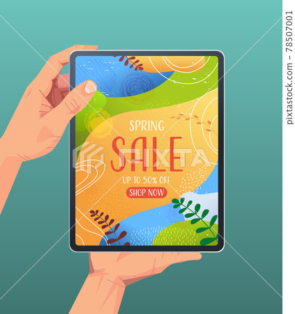 human hands using tablet pc with spring sale banner flyer or greeting card on screen vertical 78507001