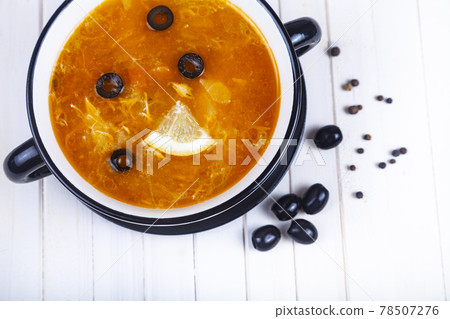 Meat Solyanka with olives and lemon 78507276