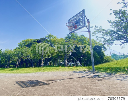 Basketball goal seen from a distance Basketball goal seen from a distance 78508379
