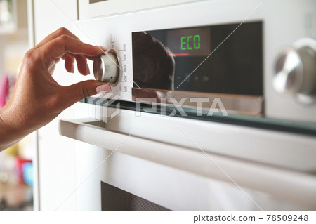 The choice of the eco mode of operation of the electric oven 78509248
