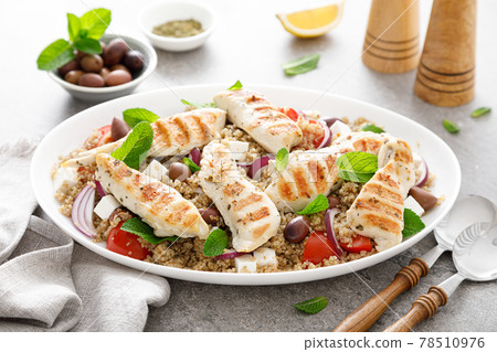 Grilled chicken breast and greek salad with quinoa 78510976