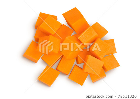 butternut squash diced isolated on white background with clipping path and full depth of field. Top view. Flat lay butternut squash diced isolated on white background with clipping path and full depth of field. Top view. Flat lay 78511326