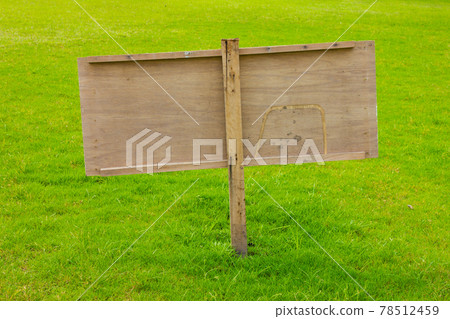 sign in green grass 78512459