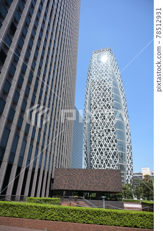 Tokyo Nishi-Shinjuku business district, skyscrapers towering against the blue sky, full size, high resolution, vertical Tokyo Nishi-Shinjuku business district, skyscrapers towering against the blue sky, full size, high resolution, vertical 78512931