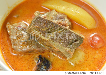 beef curry with slice potato and onion in bowl beef curry with slice potato and onion in bowl 78513479