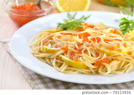 Italian spaghetti with lemon sauce, Russian trout caviar and dill Italian spaghetti with lemon sauce, Russian trout caviar and dill 78513916