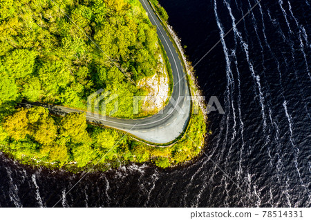 Scenic coastal road close to Parke's Castle, in County Leitrim, Ireland. 78514331