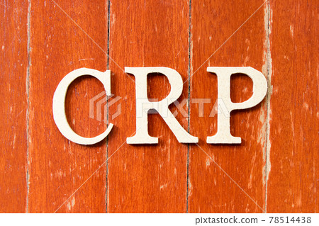 Alphabet letter in word CRP (abbreviation of C-Reactive Protein Test) on old red color wood plate background 78514438