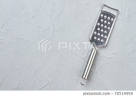 Cheese grater and copy space. Cheese grater and copy space. 78514959