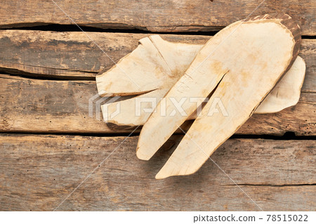 Slices of wood on rustic floor. Slices of wood on rustic floor. 78515022