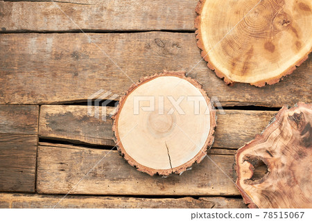 Wooden slices on rustic background. 78515067
