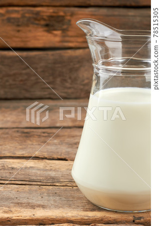 Cow milk in jug, cropped image. Cow milk in jug, cropped image. 78515305