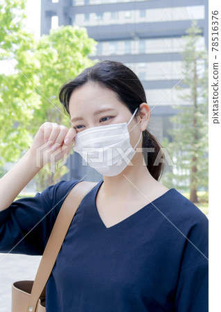 Business woman in a mask Business woman in a mask 78516376