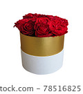 Red roses bouquet in a white and gold round gift box 78516825
