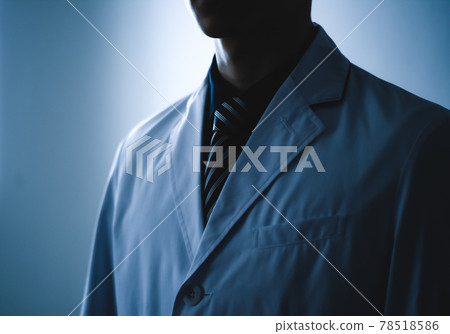 A doctor in a white robe A doctor in a white robe 78518586