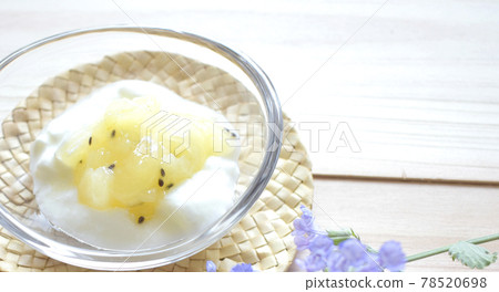 Plain yogurt with golden kiwi sauce for breakfast or dessert Plain yogurt with golden kiwi sauce for breakfast or dessert 78520698