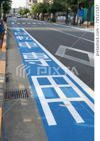 Bicycle lane Blue belt Left lane Street corner 78521587