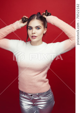 young pretty emitonal posing teenage girl on bright red background, happy smiling lifestyle people concept young pretty emitonal posing teenage girl on bright red background, happy smiling lifestyle people concept 78522182