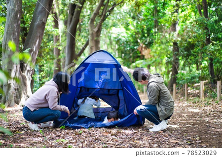 Family camping in the forest 78523029