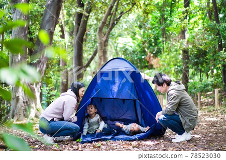 Family camping in the forest 78523030