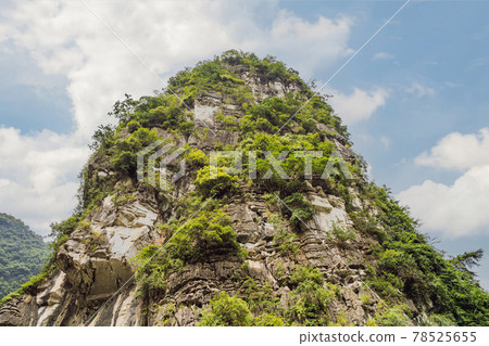 Trang An Scenic Landscape Complex in Ninh Binh Province, Vietnam A UNESCO World Heritage Site. Resumption of tourism in Vietnam after quarantine Coronovirus COVID 19 Trang An Scenic Landscape Complex in Ninh Binh Province, Vietnam A UNESCO World Heritage Site. Resumption of tourism in Vietnam after quarantine Coronovirus COVID 19 78525655