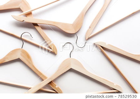 Black Friday, clothing industry concept on white background with wooden hangers Black Friday, clothing industry concept on white background with wooden hangers 78529530