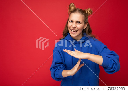 Photo of emotional angry young beautiful nice blonde woman with two horns with sincere emotions Photo of emotional angry young beautiful nice blonde woman with two horns with sincere emotions 78529963