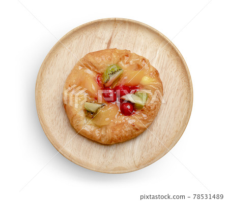 danish pastry with fruits in wooden dish isolated on white background ,include clipping path 78531489
