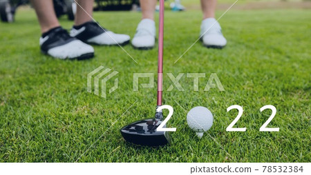 Composition of 2022 number with golf ball and golf club on golf course 78532384
