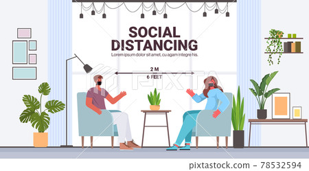 couple discussing in protective masks man woman keeping distance to prevent coronavirus social distancing 78532594