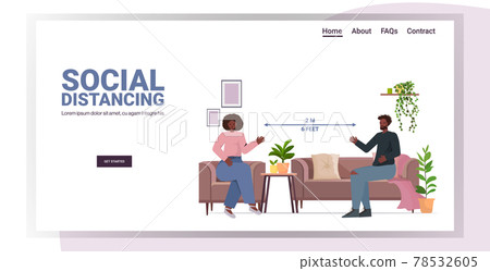 couple discussing at home man woman keeping distance to prevent coronavirus social distancing 78532605