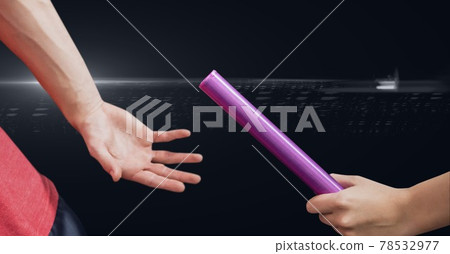 Composition of caucasian male runner passing baton to his teammate on black background 78532977