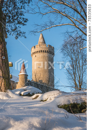 Medieval castle Kokorin in winter during sunrise. National park Kokorinsko nearby Prague in Czech Republic. Central Europe. 78535633