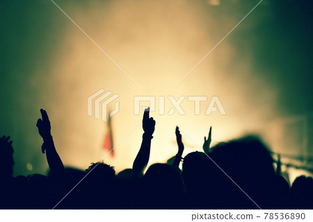 Crowd at a music concert, audience raising hands up Crowd at a music concert, audience raising hands up 78536890