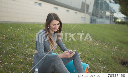 Sexy sport woman making selfie photo after training. Closeup hot female athlete posing for mobile phone camera. Attractive fitness woman taking picture by smartphone. Sport And Technology, Weight 78537468