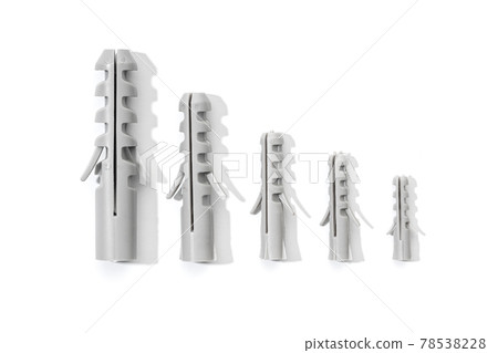 Group of Plastic dowels isolated on a white background. Wall plugs in different sizes Group of Plastic dowels isolated on a white background. Wall plugs in different sizes 78538228