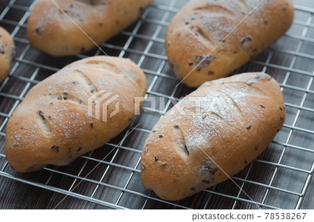 cranberry and walnut bread on rack 78538267