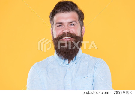 brutal bearded hipster with groomed beard is professional haircutter in white shirt, hairdresser brutal bearded hipster with groomed beard is professional haircutter in white shirt, hairdresser 78539198