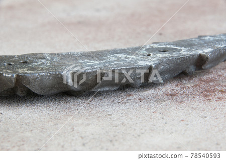 Old aluminum onlay on concrete background. 78540593