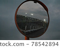 Train reflected in the mirror 78542894