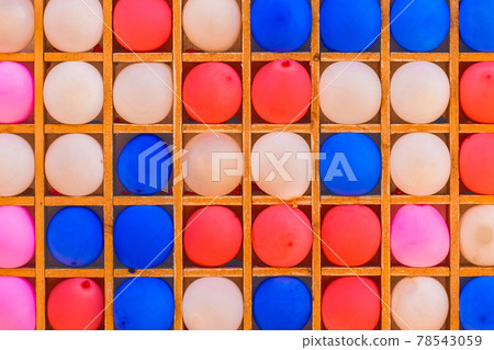 Multicolored bright air balloons background for playing darts game 78543059
