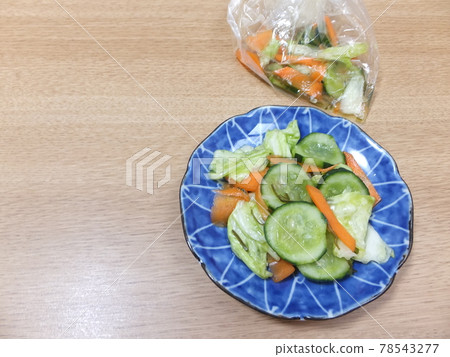 Lightly pickled cucumber, cabbage and carrot 78543277