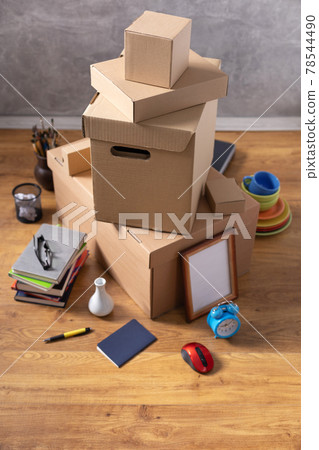 Cardboard boxes and things for moving to new home. Stack of cardboard box on floor background. Cardboard boxes and things for moving to new home. Stack of cardboard box on floor background. 78544490