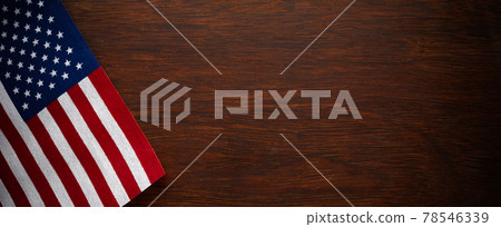 American flag for Memorial Day or 4th of July on dark wooden background 78546339