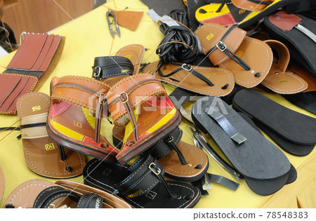 PUTRAJAYA, MALAYSIA -JANUARY 29, 2017: Malaysian Malay traditional shoes called capal originally made from animal leather. Handmade and special design for man.  78548383